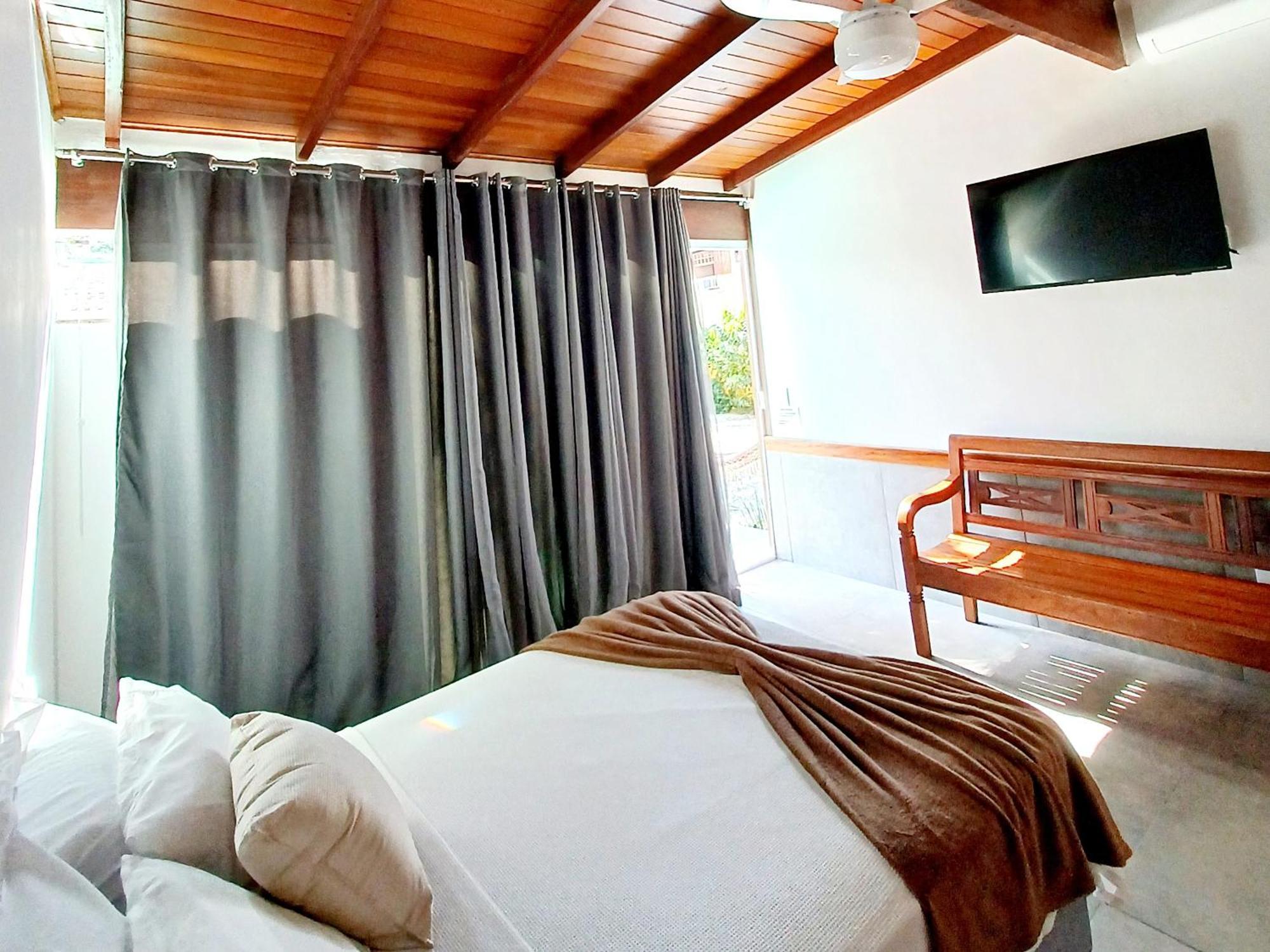 Suites Estou De Ferias Параті Номер фото